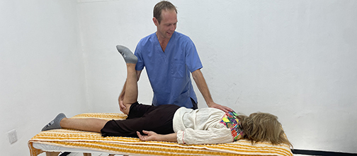 osteopath performing an osteopathic manipulation